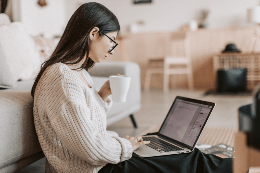 Author working comfortably with LitArc query tools on a laptop